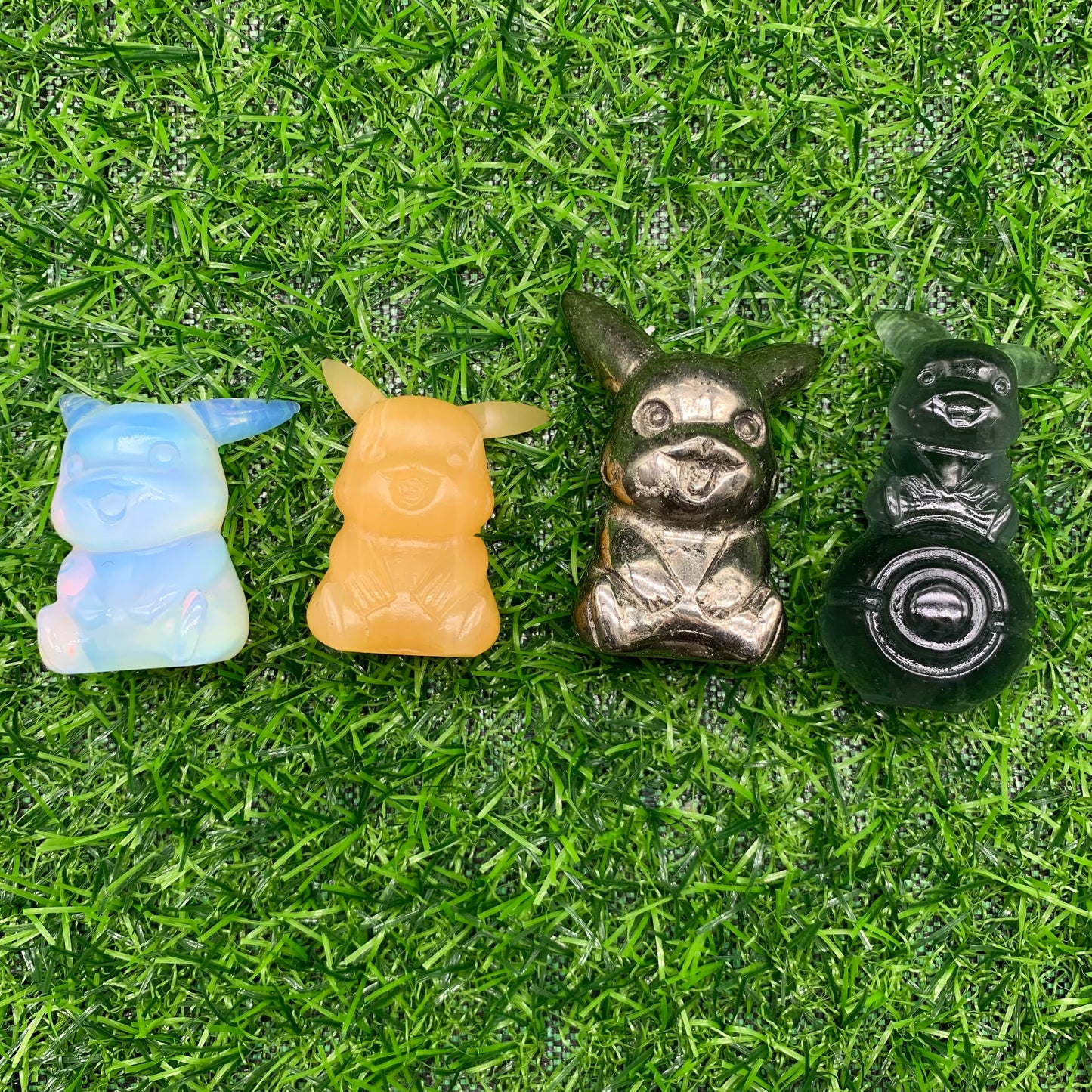 Four Pikachu Pokemon carving