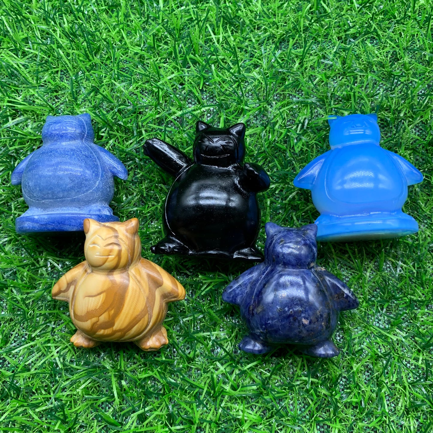 Five Snorlax Pokemon carving