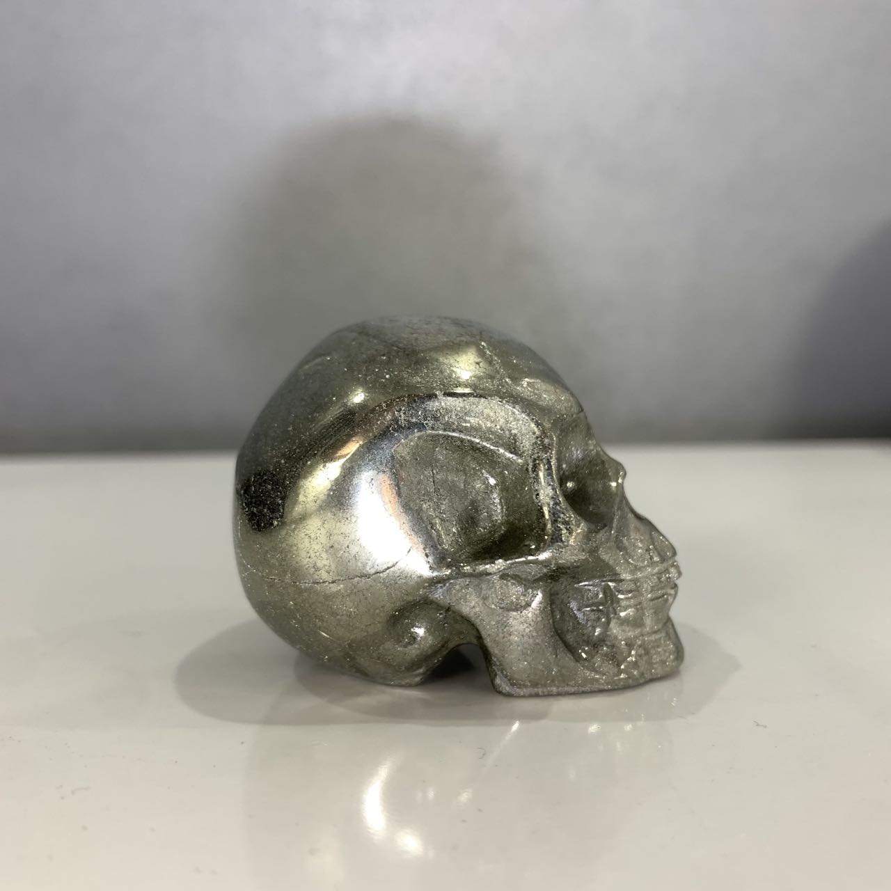 Pyrite skull carving