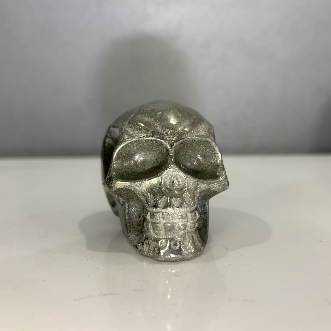 Pyrite skull carving